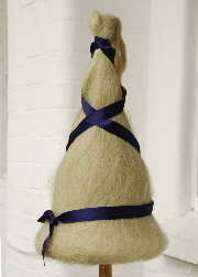 Cone distaff dressed with flax